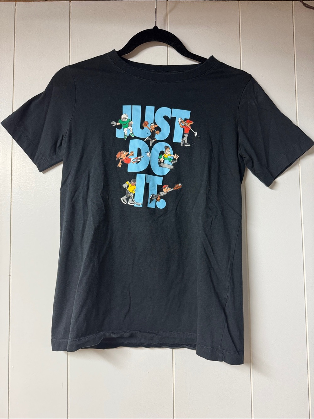 Nike Black Tee with Light Blue 'Just Do It' Graphic and Multicolor Characters